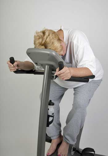 tired woman on bicycle